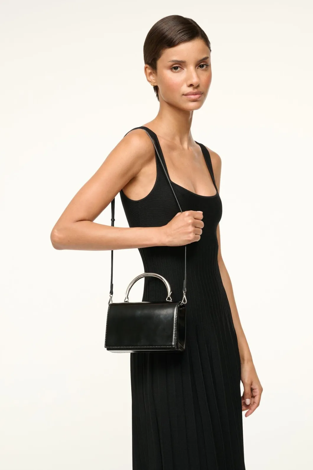 staud_arc_evening_bag_black_3.webp STAUD ARC EVENING BAG< The Evening Edit