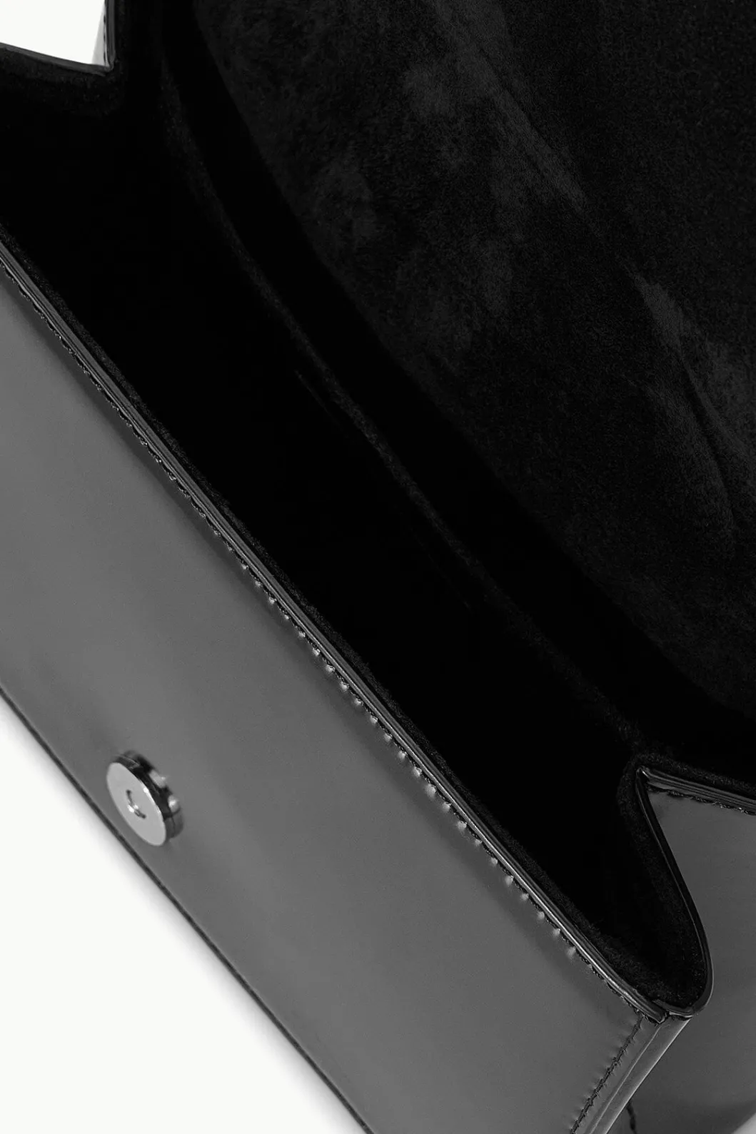 staud_arc_evening_bag_black_6.webp STAUD ARC EVENING BAG< The Evening Edit