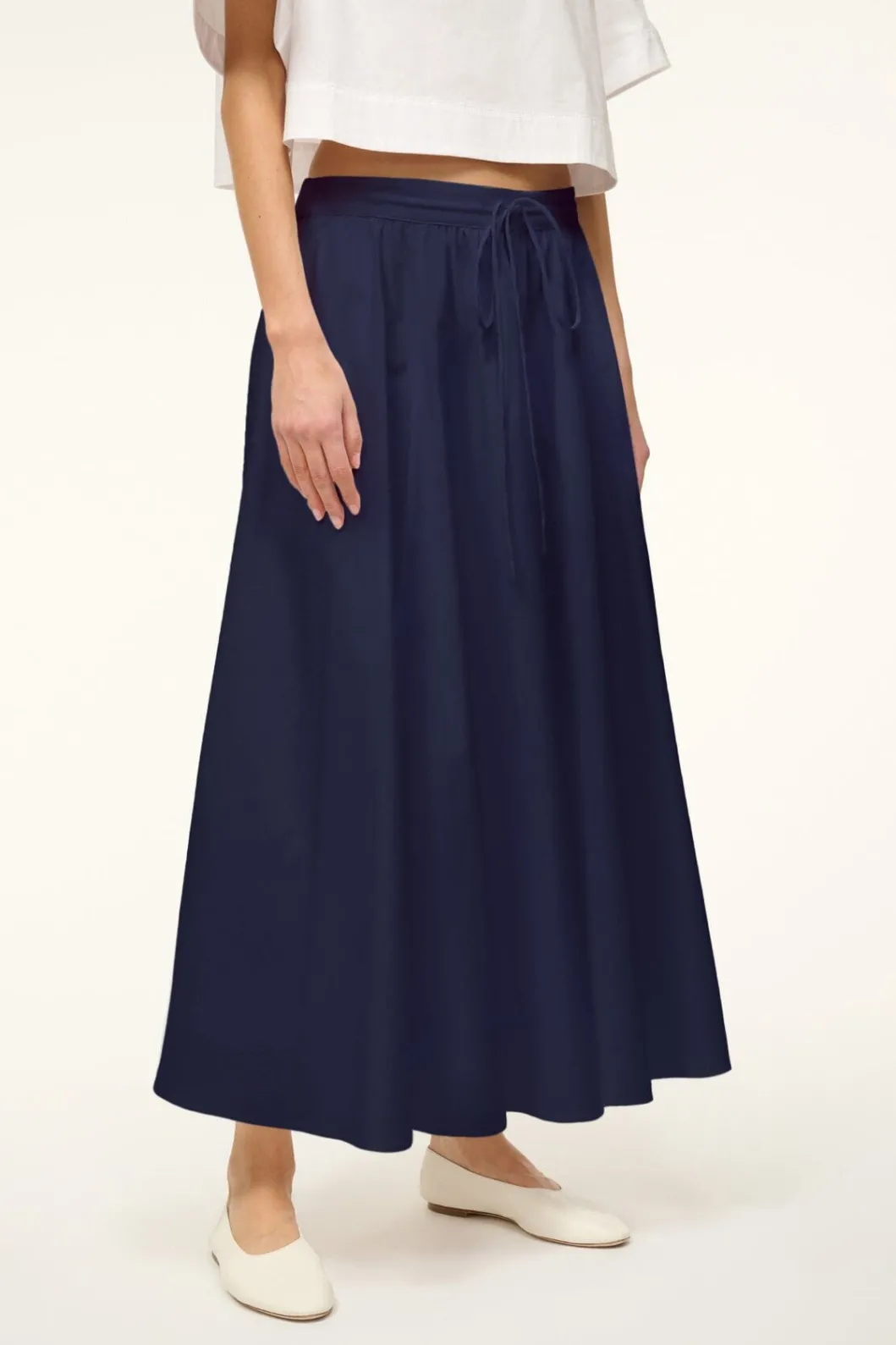 staud_eden_skirt_navy_2.webp STAUD EDEN SKIRT< Skirts