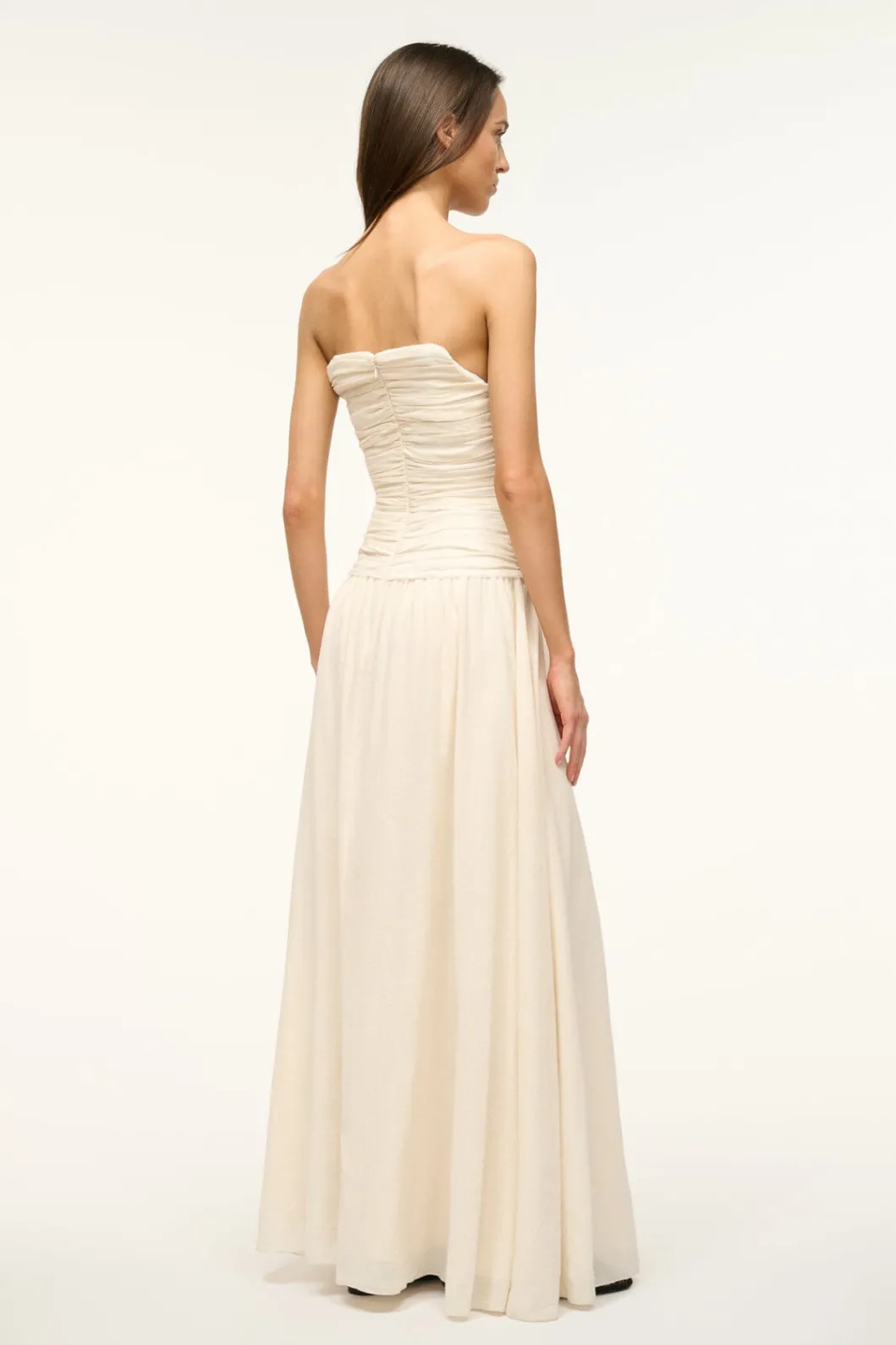 staud_hightide_dress_buttercream_3.webp STAUD HIGHTIDE DRESS< The Evening Edit