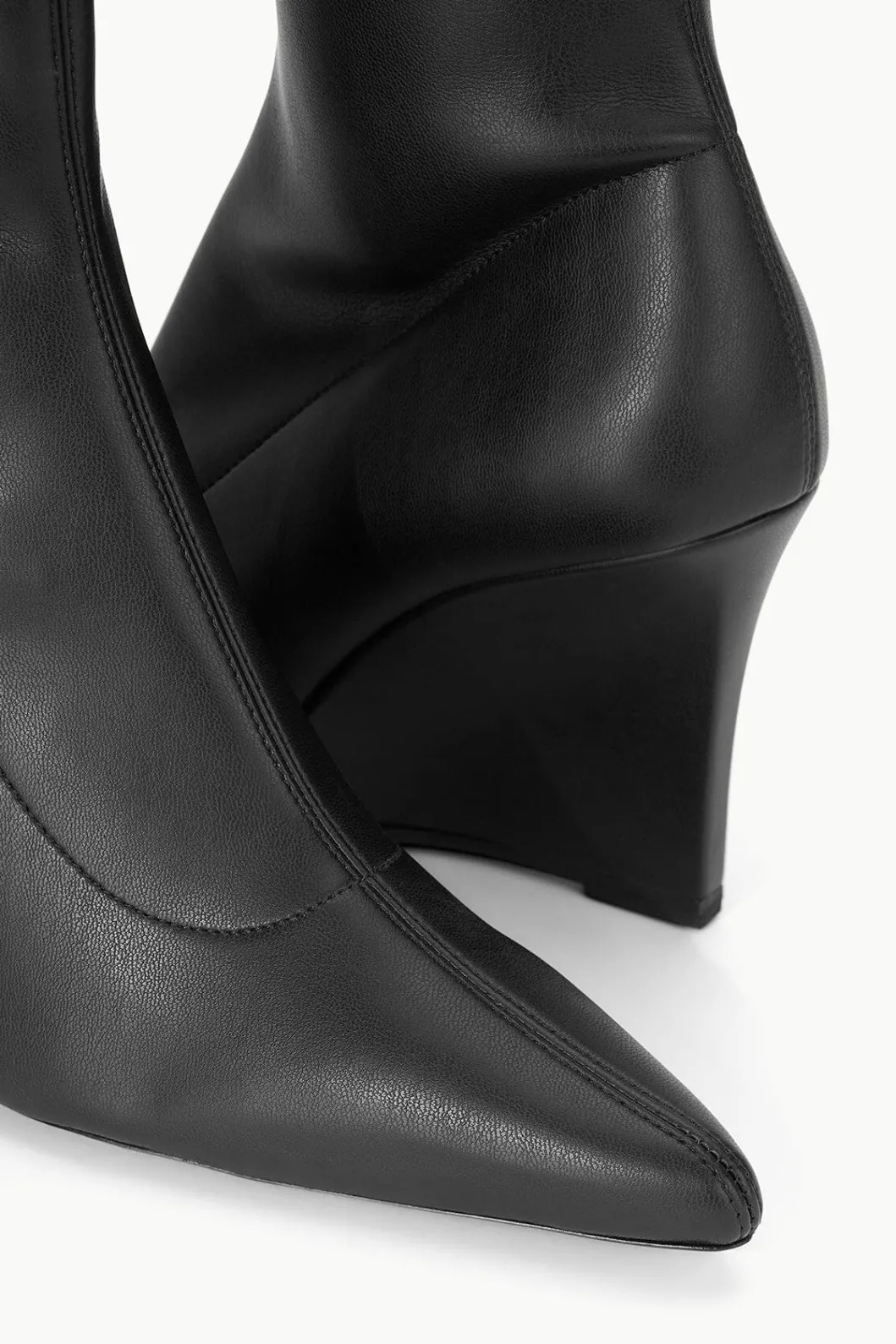 staud_vesper_ankle_wedge_boot_black_5.webp STAUD VESPER ANKLE WEDGE BOOT< Boots | Platforms & Wedges