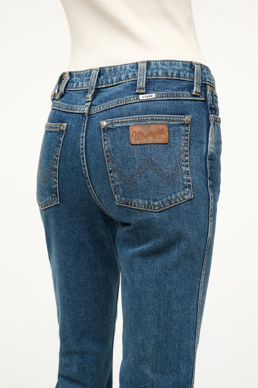 staud_wrangler_the_cropped_boot_jean_indigo_wash_3.webp STAUD WRANGLER THE CROPPED BOOT JEAN INDIGO WASH< Denim | Pants & Shorts