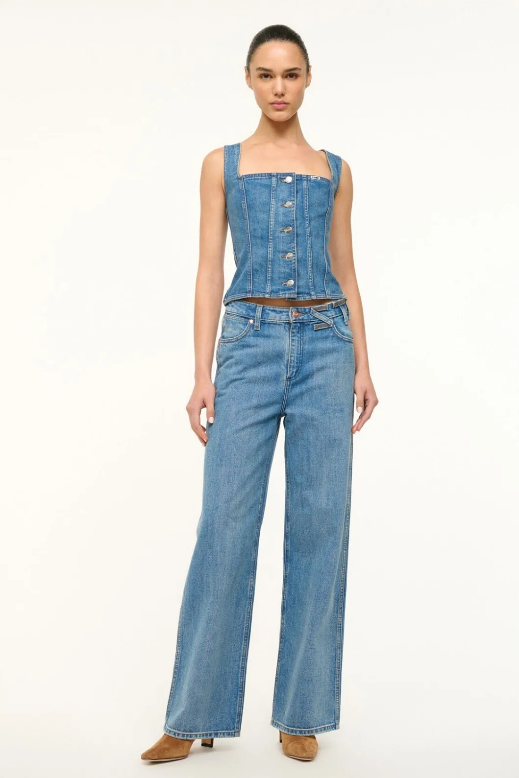 staud_wrangler_trucker_top_indigo_wash_2.webp STAUD WRANGLER TRUCKER TOP INDIGO WASH< Denim | Tops