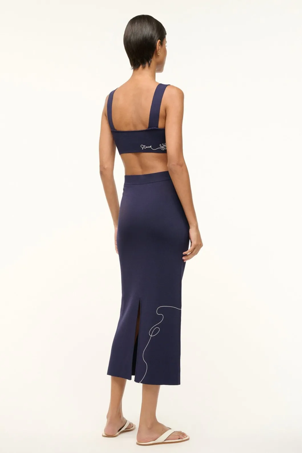 staud_zola_top_navy_white_3.webp STAUD ZOLA TOP NAVY WHITE< Tops